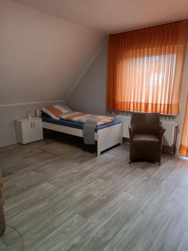 Ένα ή περισσότερα κρεβάτια σε δωμάτιο στο Gästehaus Atrico Haus 49