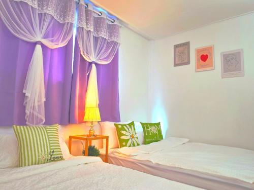 Postel nebo postele na pokoji v ubytování 인스테이