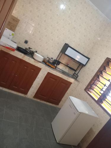 Kuchyň nebo kuchyňský kout v ubytování Appartement dona