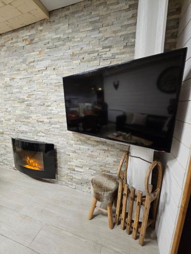 Televisor o centre d'entreteniment de Chalet Alpha