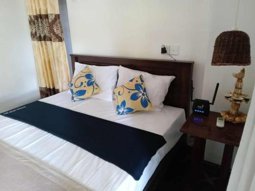 Ein Bett oder Betten in einem Zimmer der Unterkunft The Little House villa Ahangama