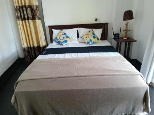Ein Bett oder Betten in einem Zimmer der Unterkunft The Little House villa Ahangama