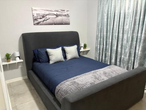 Ένα ή περισσότερα κρεβάτια σε δωμάτιο στο Urban Hideaway