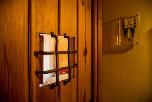 
a door that is open with a light on it at Hotel Boutique Posada Dos Orillas in Trujillo
