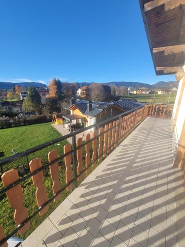 a balcony with a view of a park at Cuore d'Altopiano, vivere Asiago in Asiago