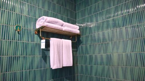 Koupelna v ubytování Luxury Malioboro Hotel