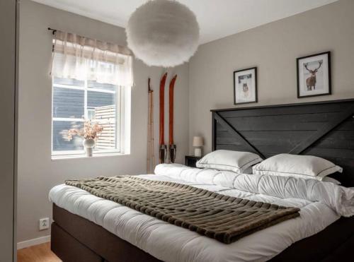 En eller flere senge i et værelse på Boende i Lindvallen, Sälen