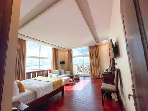 Postel nebo postele na pokoji v ubytování Lbn Asian Hotel