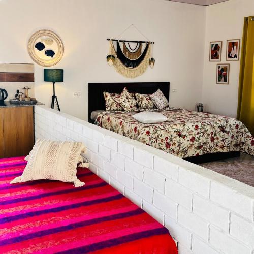 Postel nebo postele na pokoji v ubytování The Blue Boheme Bir