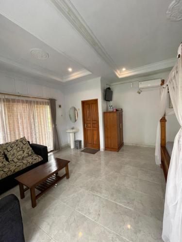 TV a/nebo společenská místnost v ubytování Sekumpul Guest House