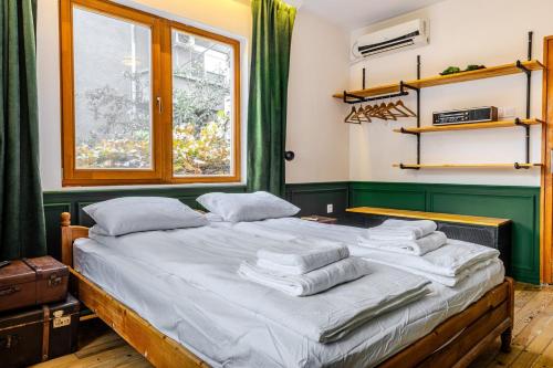 Postel nebo postele na pokoji v ubytování Paganini House close to Center and Rowing Canal