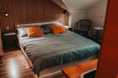 Postel nebo postele na pokoji v ubytování Apartmány v ráji (Českém)