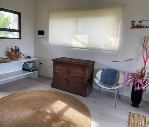 Coin salon dans l'établissement Casa Baleia Azul 8A Ponta Mamoli