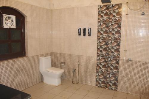 Koupelna v ubytování Royal Jungle Kothi