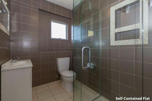 Ένα μπάνιο στο Comfortable & private flat - 7-min drive to Wanaka