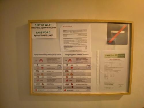 a poster on a wall on a wall at Maria’s apartment in Amfilochía