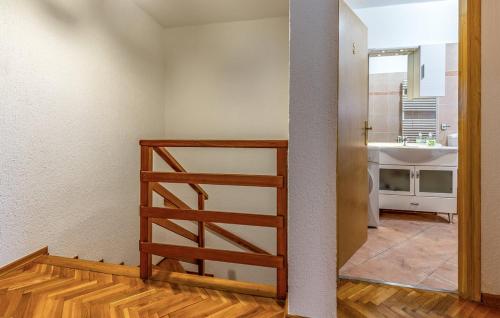 a stairwell in a room with a kitchen at House Ivica in Banjole