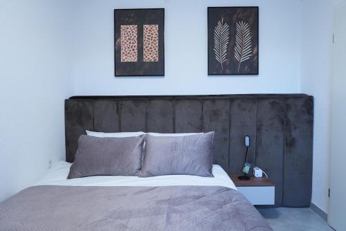 Postel nebo postele na pokoji v ubytování Wohnung IA - Modernes Twin-Apartment