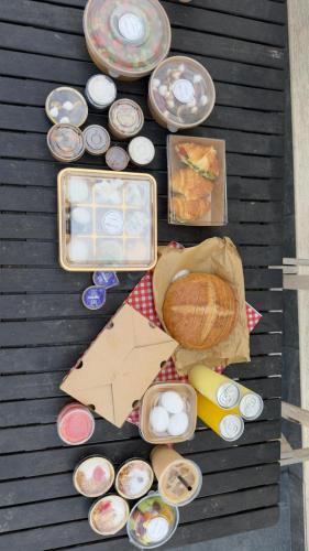 a bunch of plates of food on a table at סוויט ריזורט בגורן in Goren