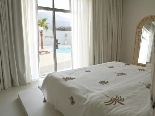 Ένα ή περισσότερα κρεβάτια σε δωμάτιο στο Pool Villa Daya