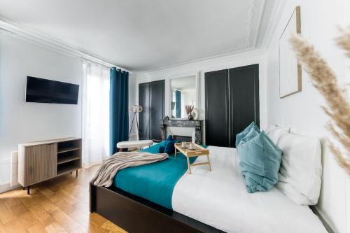 Postel nebo postele na pokoji v ubytování Charmant T2 aux portes de Paris 2 min de la gare