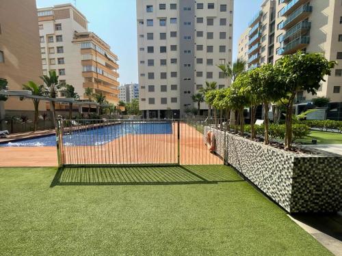 Swimmingpoolen hos eller tæt på Apartamentos Abedules 3