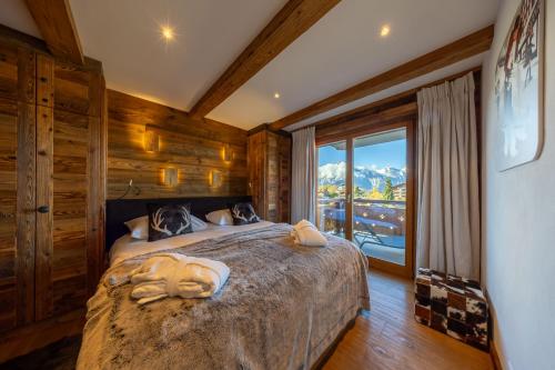 Ένα ή περισσότερα κρεβάτια σε δωμάτιο στο Glacier 5 - Hammam - Spa Access