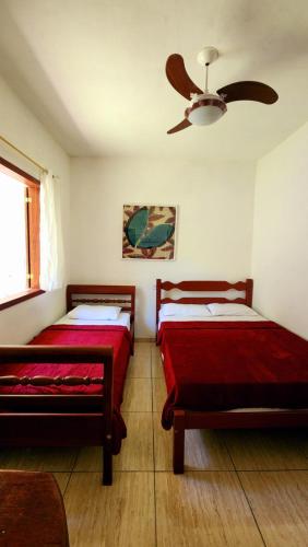 Ένα ή περισσότερα κρεβάτια σε δωμάτιο στο Casa Flora