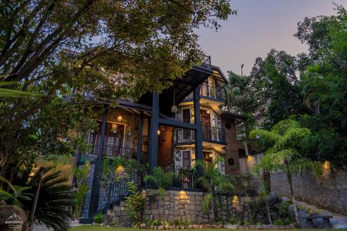 a large house with lights in front of it at Winterfell Bandarawela in Bandarawela