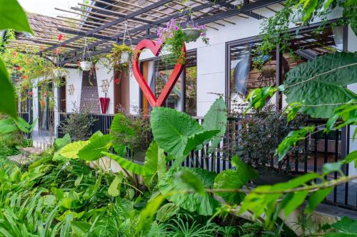 Zahrada ubytování San Signature - Suối Ngọc Retreat