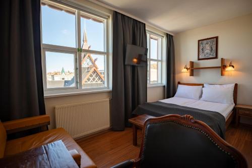 Llit o llits en una habitació de Hotel Viking