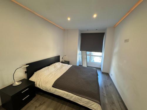 Postel nebo postele na pokoji v ubytování Immodelpas Pessons