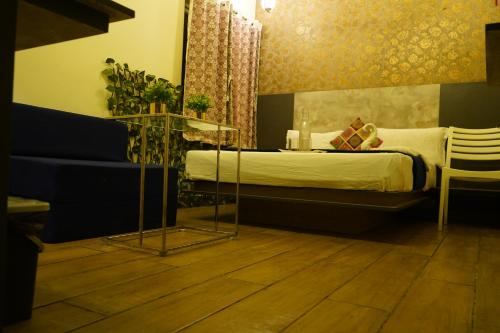 Postel nebo postele na pokoji v ubytování Hotel Happy Hill