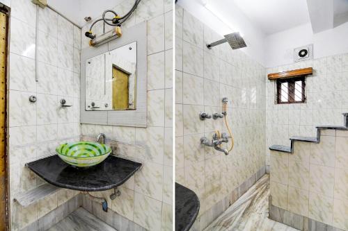 a bathroom with a sink and a shower at Hotel O Avenue Villa in Dum Dum