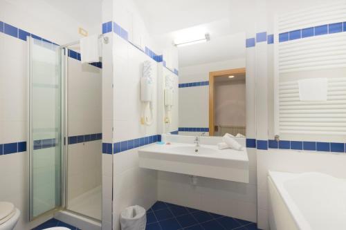 Ένα μπάνιο στο Hotel Club Regina E Fassa
