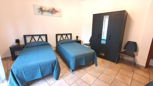 En eller flere senge i et værelse på Stella Maris Family Home