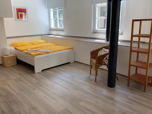 Ένα ή περισσότερα κρεβάτια σε δωμάτιο στο Smartroom Apartment in Bremgarten