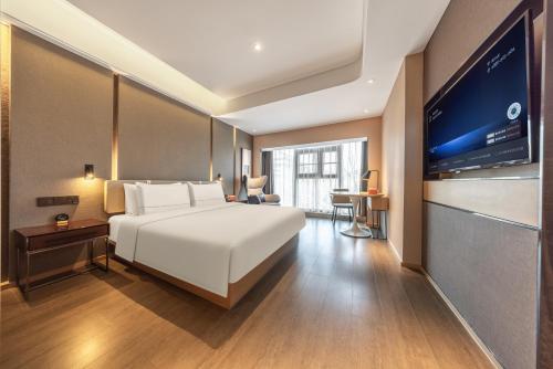 Postel nebo postele na pokoji v ubytování Atour Hotel Xian Bell Tower Yongningli