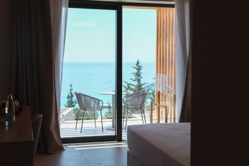 Φωτογραφία από το άλμπουμ του Drymades Inn Resort σε Dhërmi