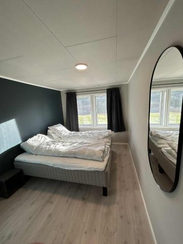 Postel nebo postele na pokoji v ubytování Villa Isfjorden