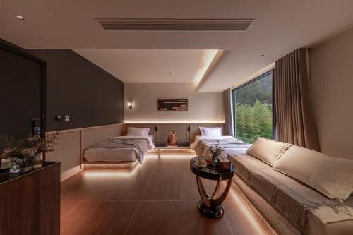 Posezení v ubytování Wuyun Guanshan Yue Designer Hotel