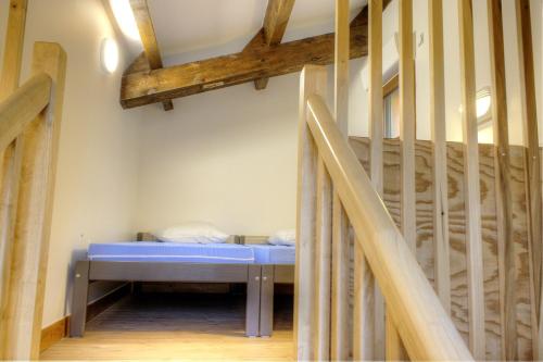 Ένα ή περισσότερα κρεβάτια σε δωμάτιο στο Les romarins d'auvare