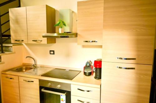 Kuchyň nebo kuchyňský kout v ubytování Comfortable apartment in the center