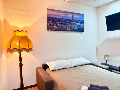 Postel nebo postele na pokoji v ubytování Comfortable apartment in the center