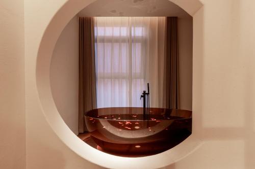 Koupelna v ubytování Wuyun Guanshan Yue Designer Hotel