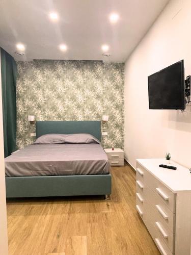 Ένα ή περισσότερα κρεβάτια σε δωμάτιο στο La Dimora del mare - Cozy & Relax - 800m dal mare