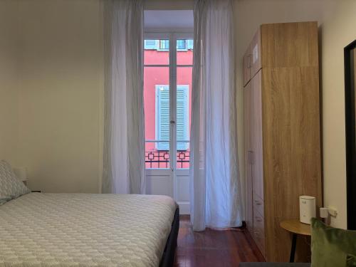 Ένα ή περισσότερα κρεβάτια σε δωμάτιο στο Casa Malvina