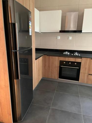 Η κουζίνα ή μικρή κουζίνα στο L' Oasis marine