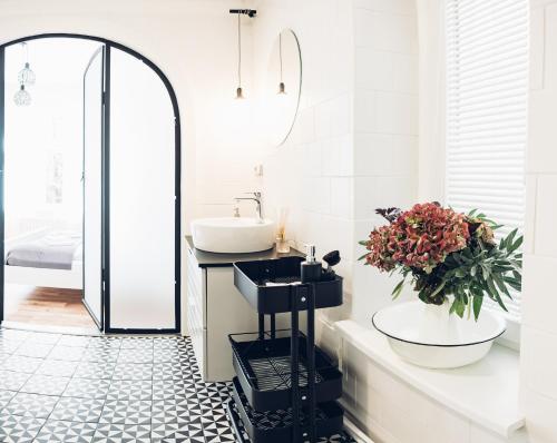 a bathroom with a sink and a mirror at Ubytování Javorka in Česká Třebová