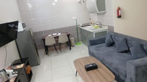 Μια τηλεόραση ή/και κέντρο ψυχαγωγίας στο شقق ترانيم السراة للشقق المخدومة - تصنيف اقتصادي